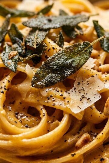 Creamy roasted butternut squash fettuccine with crispy sage, pine nuts, and parmesan